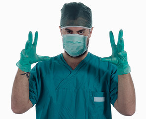 Young surgeon with gloves ready for surgery