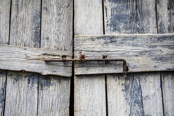 Door with deadbolt for closure