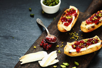 Gourmet sandwiches with camembert and cranberries