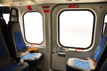 Helicopter interior and seat for passenger