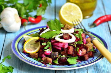 Beetroot salad with calamari and rye garlic croutons.