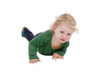 Adorable blond baby lying on the floor