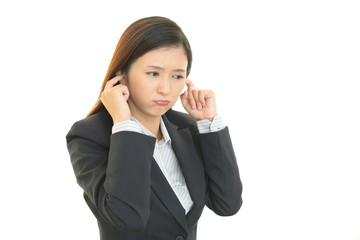 困った表情のOL