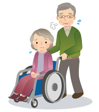 車椅子に乗る高齢者　夫婦　老老介護