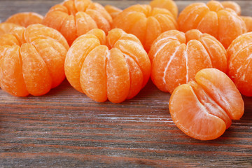 Tangerines on wooden table