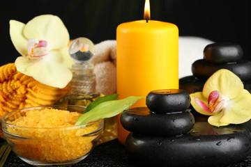 Fototapeta na wymiar Beautiful spa composition with candle and orchid