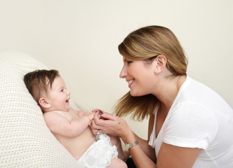 Mother Playing with Baby