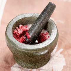 Salt and redberry marinade in mortar