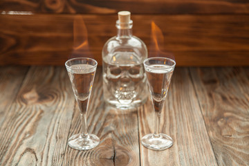 Shot glasses with alcohol on fire