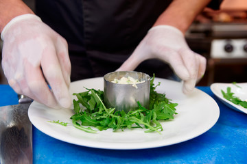 Chef is cooking appetizer