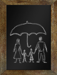 Concept of happy family in safety. Chalk drawing