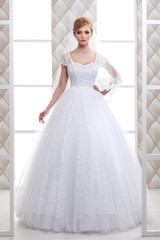 Fototapeta premium beautiful bride in a wedding-dress. Wedding decorations