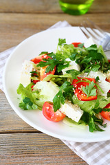 Delicious salad with tomatoes, peppers and cheese