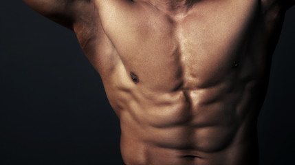Fototapeta na wymiar Body of muscular man