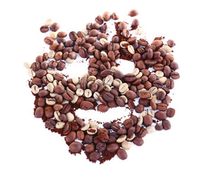 Funny face shaped coffee beans isolated on white