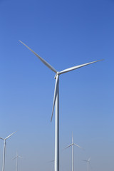 Fototapeta premium Wind turbine producing alternative energy