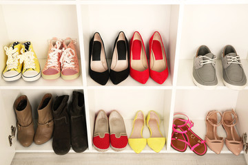 Collection of shoes on shelves