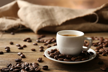 Cup of coffee on wooden table