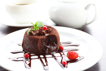 Hot chocolate pudding with fondant centre, close-up