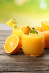 Glass of orange juice and slices