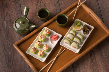 Fototapeta na wymiar Japanese seafood vegetarian sushi set on white plate