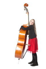 young girl embraces double bass in studio