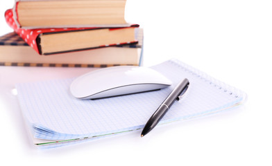 Pile of books and computer mouse isolated on white