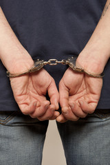 Prisoner locked in handcuffs