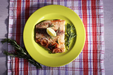 Dish of Pangasius fillet with rosemary and lime