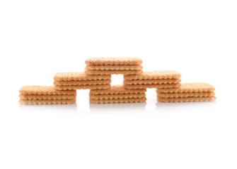 stack of coconut crackers on white background