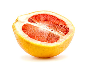 Half cut grapefruit isolated on white