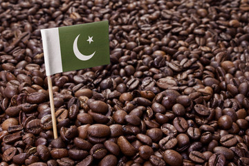 Flag of Pakistan sticking in coffee beans.(series)