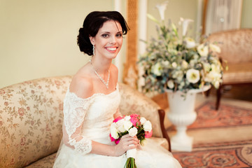 portrait of beautiful bride in luxury interior 