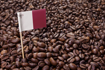 Flag of Malta sticking in coffee beans.(series)