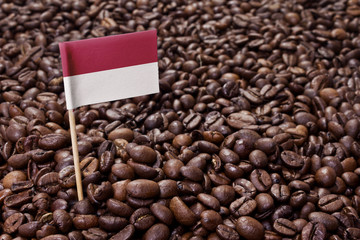 Flag of Monaco sticking in coffee beans.(series)