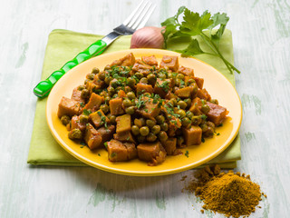 seitan stew with peas and curry, vegetarian food