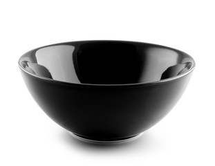black ceramic bowl on white background © sommai