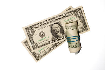 A few US banknotes on a white background