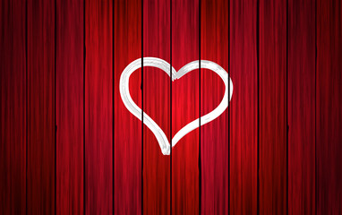 Corazón blanco pintado en fondo de madera roja.