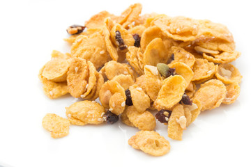 cornflakes and caramel isolated on white background