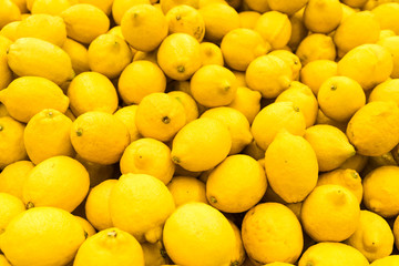 Colorful Display Of Lemons In Fruit Market