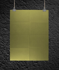 Golden poster on a rope.