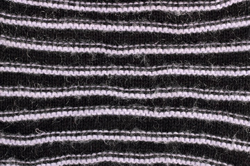 Texture of a striped knitted sweater