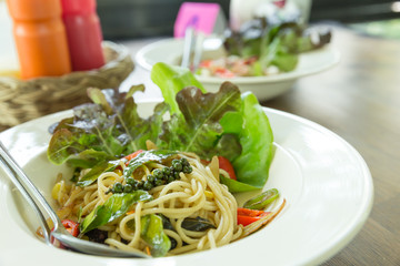 Spaghetti noodles on white plate