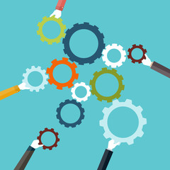 Concept of teamwork holding colorful cogwheel