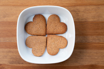 white bowl with homemade cookies