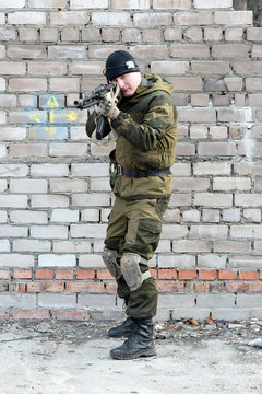 soldier in camouflage uniform