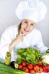 beautiful young chef woman prepare and decorating tasty food in