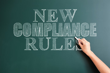 new compliance rules written on blackboard