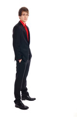 Young businessman standing on white background